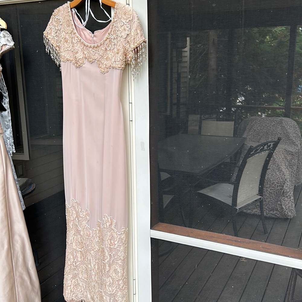 Designer hand beaded nude color and cream evening gown.